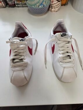 Forrest Gump" colorway, featuring a white leather upper with a red Swoosh. 